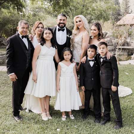 Charlotte Flair with her family on her wedding day.